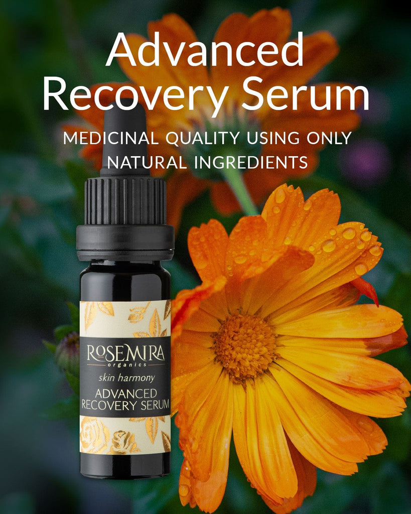 Rosemira Advanced Recovery Serum bottle with orange flowers in the background