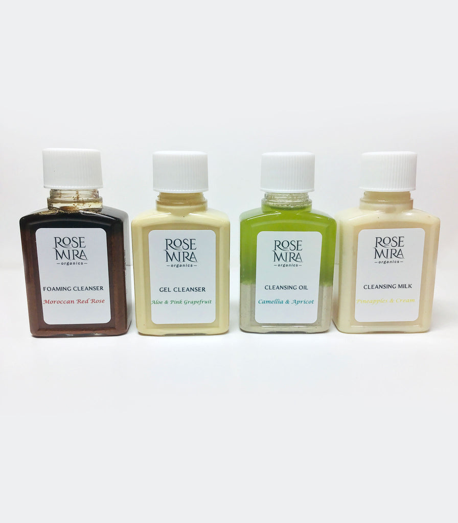 A row of organic travel-sized cleansers sold as a collection