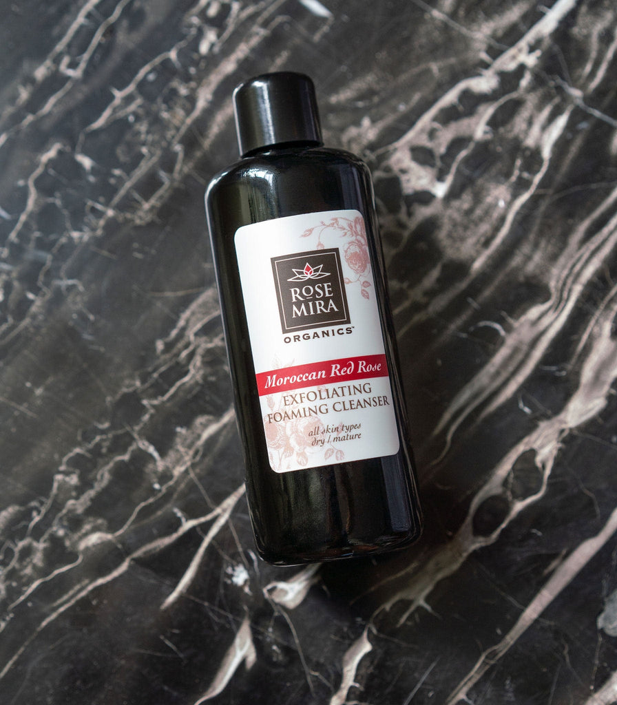 Moroccan Red Rose Exfoliating/Foaming Cleanser on black marble