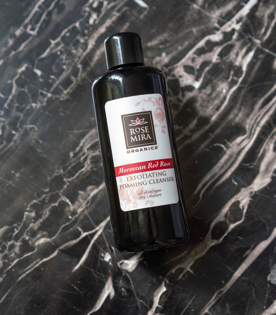 Moroccan Red Rose Exfoliating/Foaming Cleanser on black marble