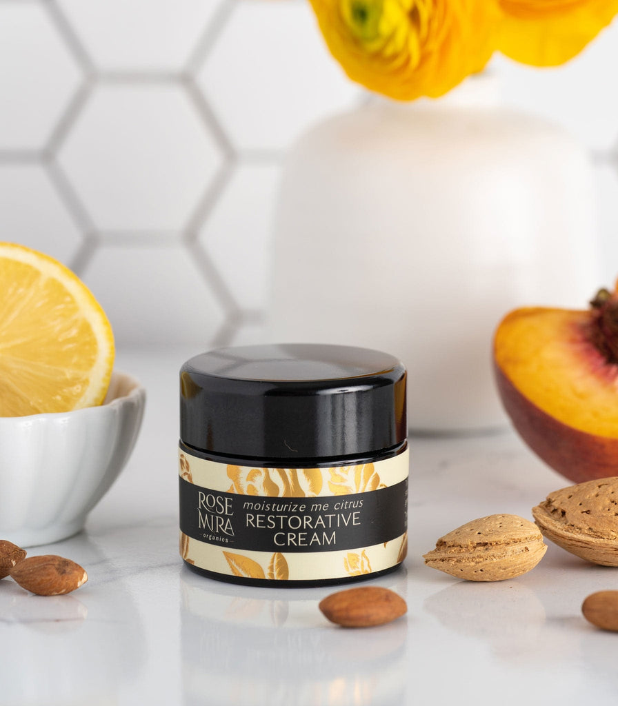 Moisturize Me Citrus Face Cream with almonds, lemon, peach, yellow flowers.