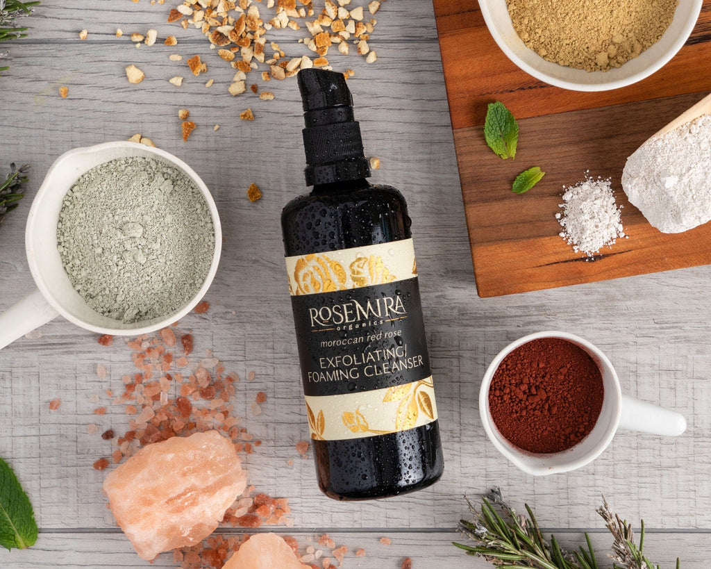 Rosemira Organics bottle with a selection of natural ingredients.