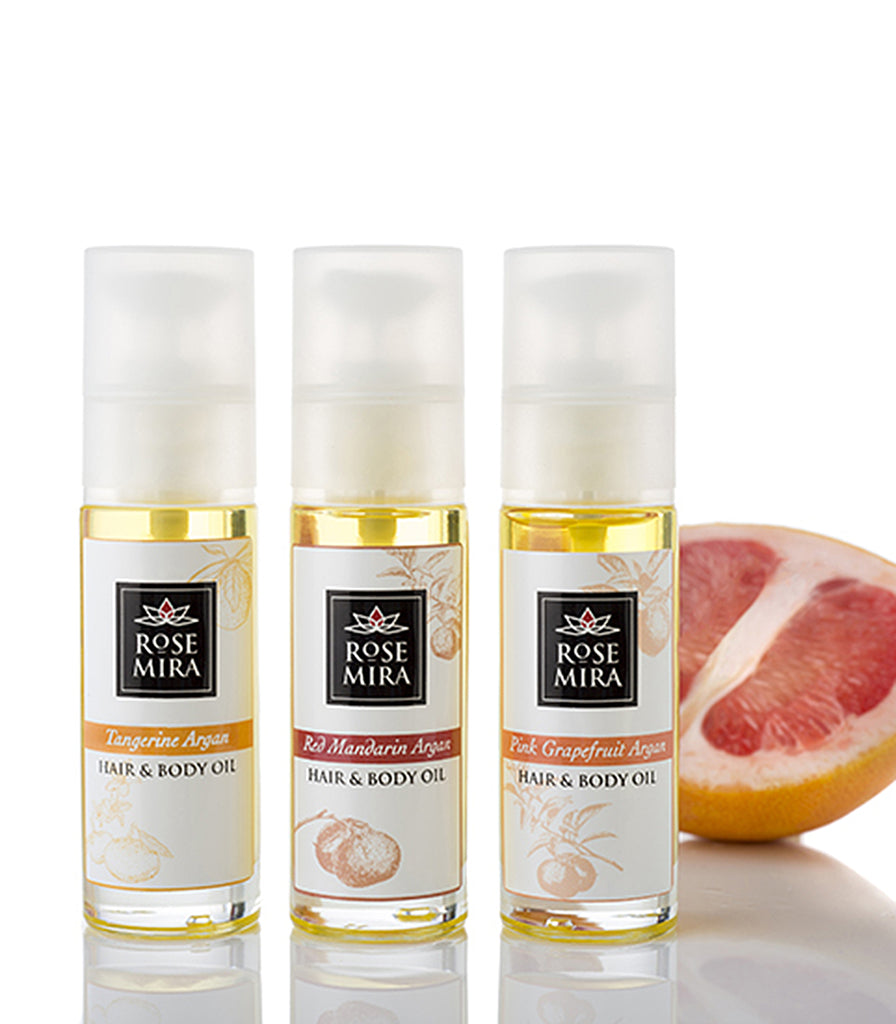 Three Argan Hair and Body Oil Flavors with half a grapefruit