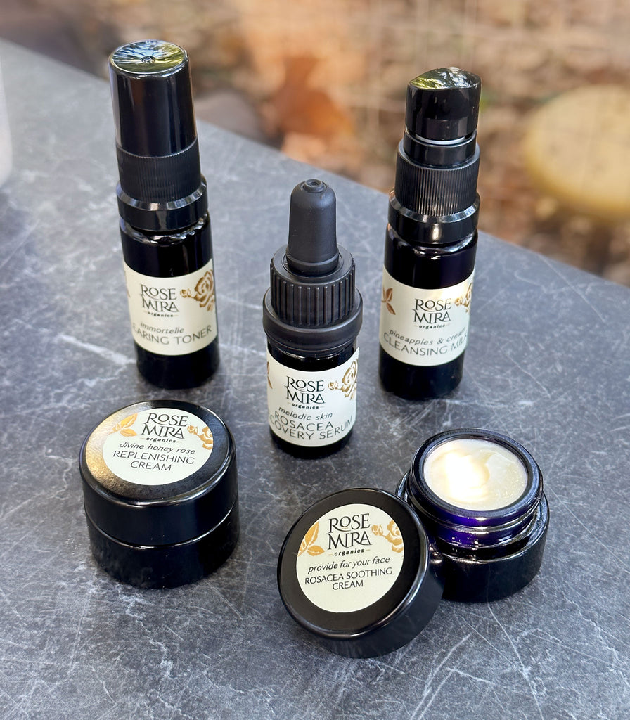 Angled view of five products in the Rosacea Repair Mini Collection Kit