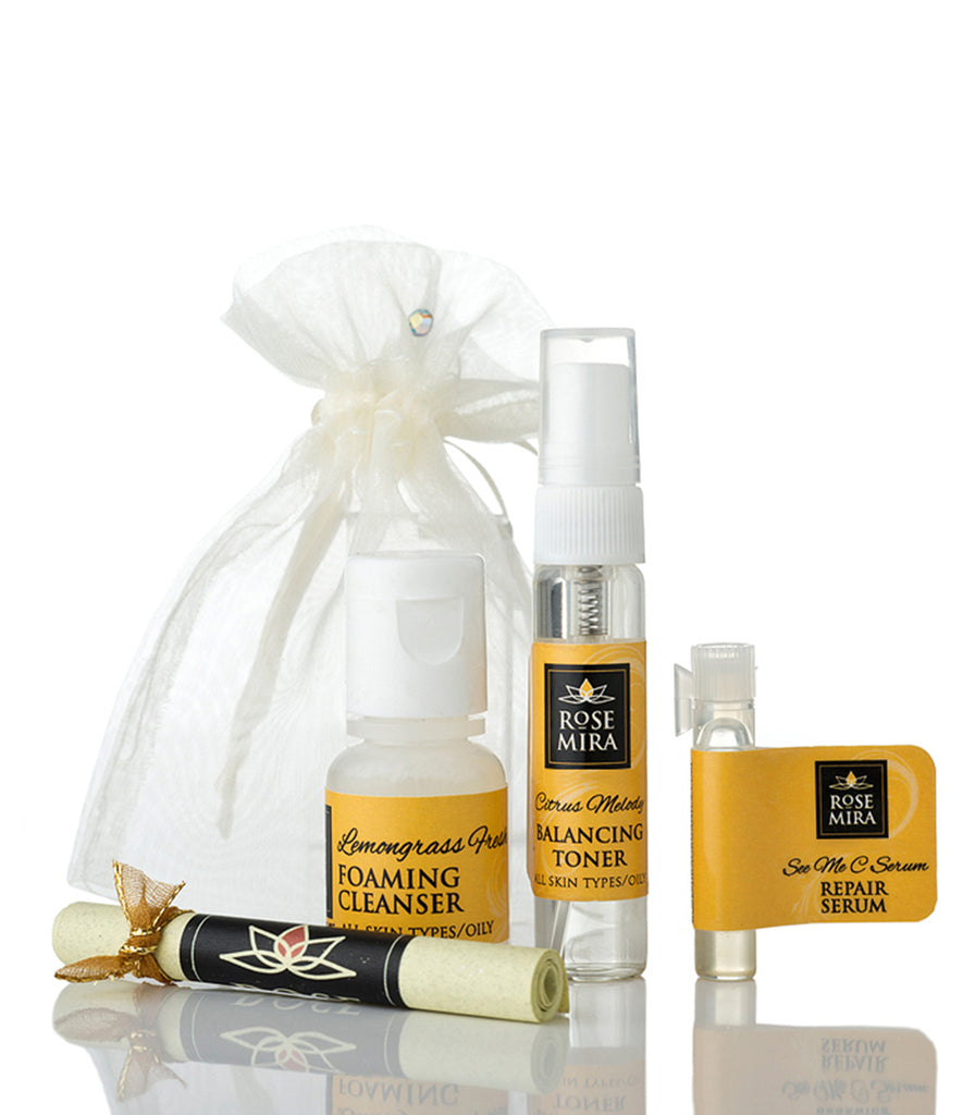 A Rosemira sample kit for combination/oily skin with three samples, a coupon, and an organza bag.