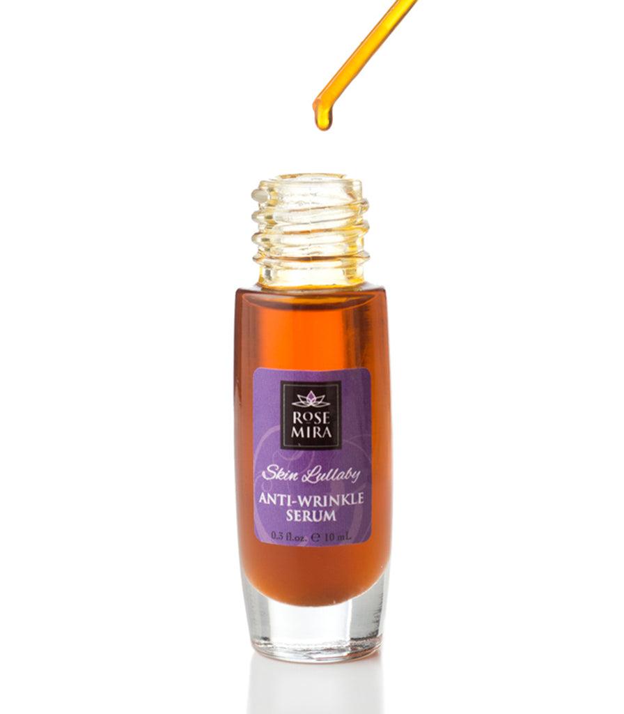 A clear bottle of Anti-Wrinkle Serum showing the deep golden color.