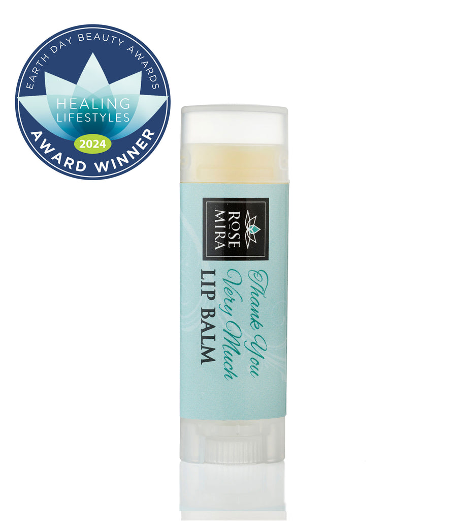 Thank You Very Much organic lip balm with mint green label and Earth Day Beauty Awards Winner graphic