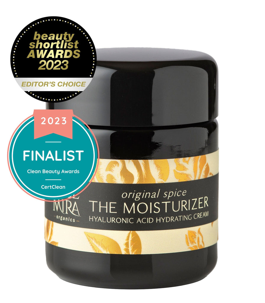 The Moisturizer in Original Spice in black miron glass on white with Beauty Shortlist Awards 2023 Editor's Choice badge and Clean Beauty Awards logo