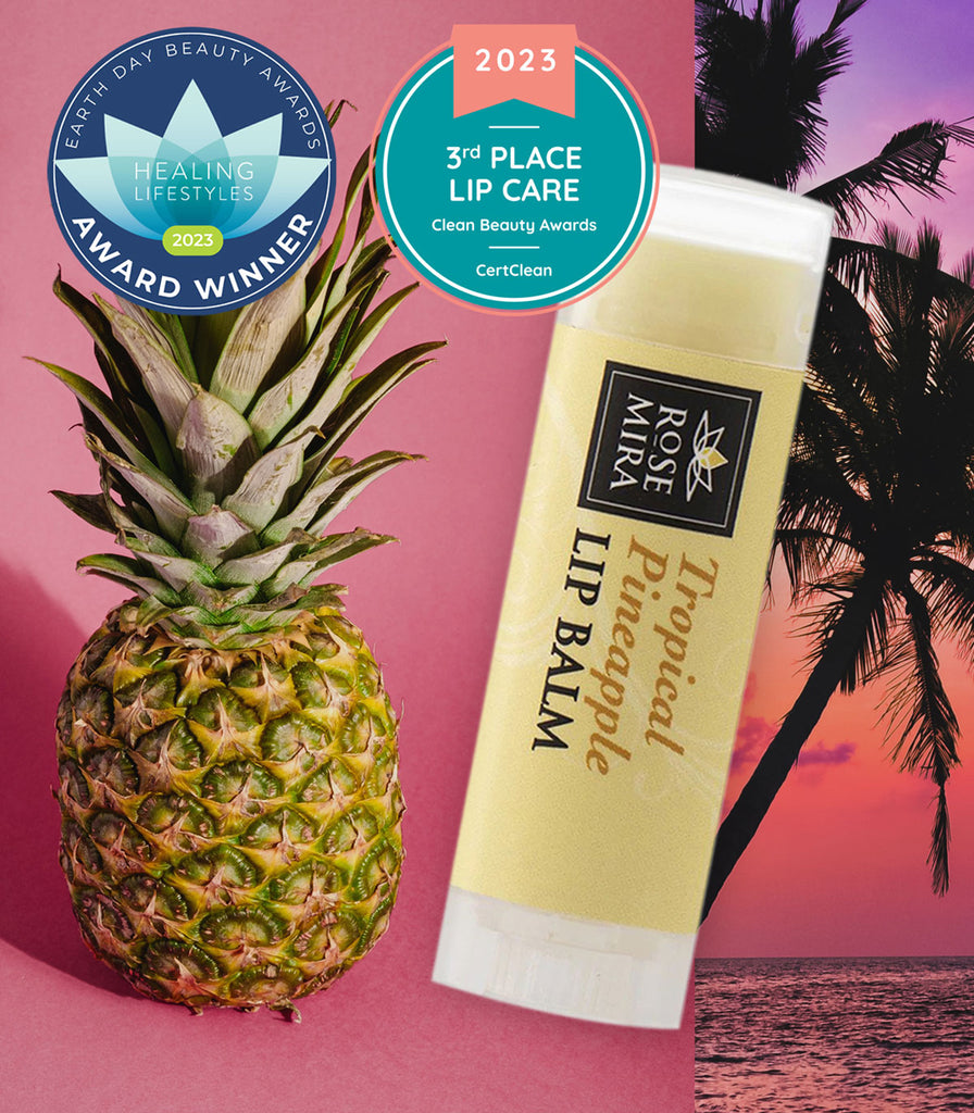 Award-winning organic tropical pineapple lip balm with pineapple and palm trees.