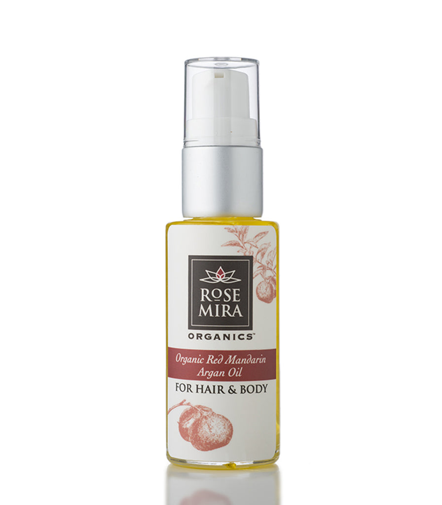 Organic Red Mandarin Argan Oil for Hair and Body in a clear bottle