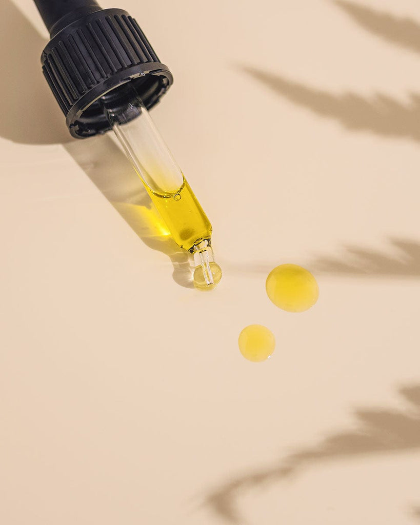 Demonstration of applying Rosemira serum drops for radiant skin