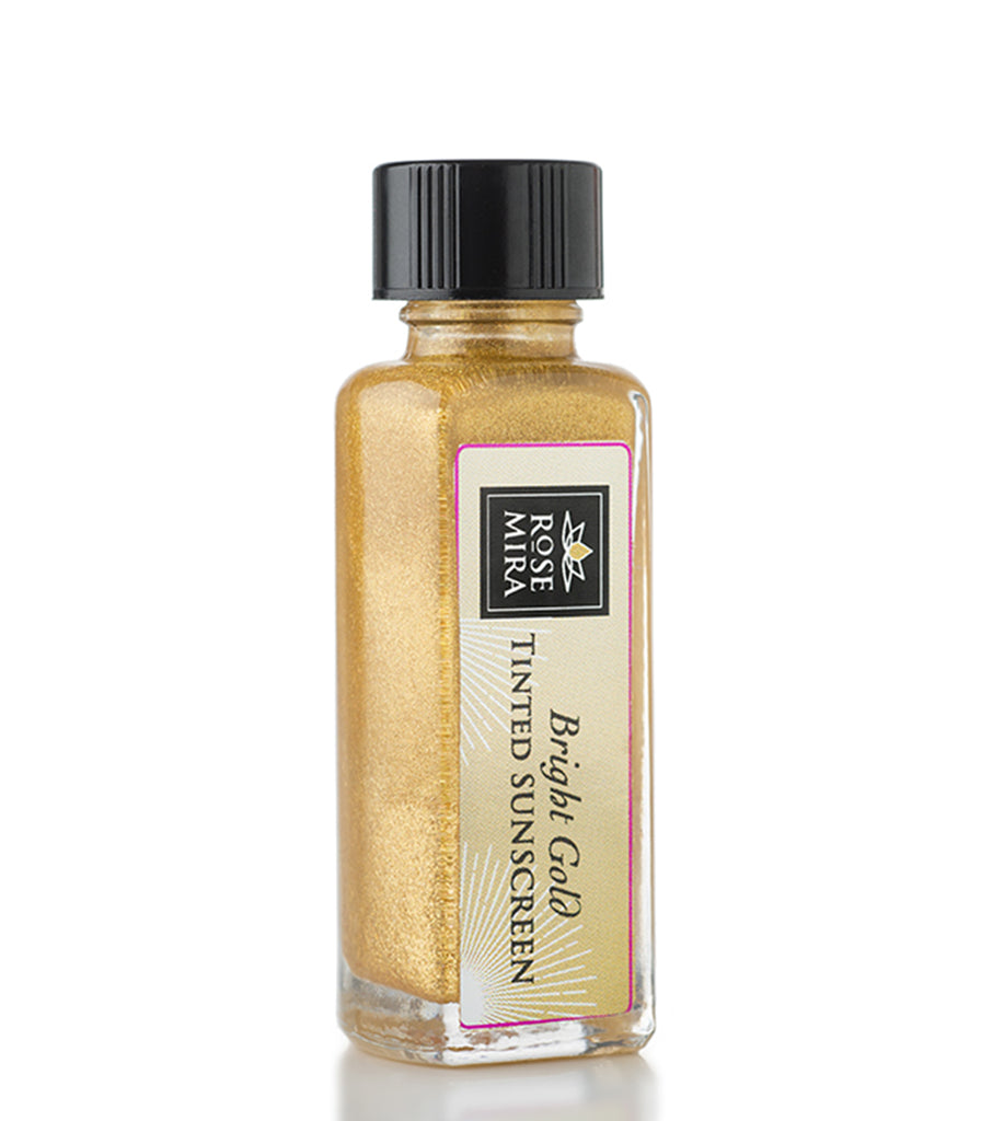 Forward-facing Bright Gold Tinted Serum, organic serum with natural sunscreen properties.