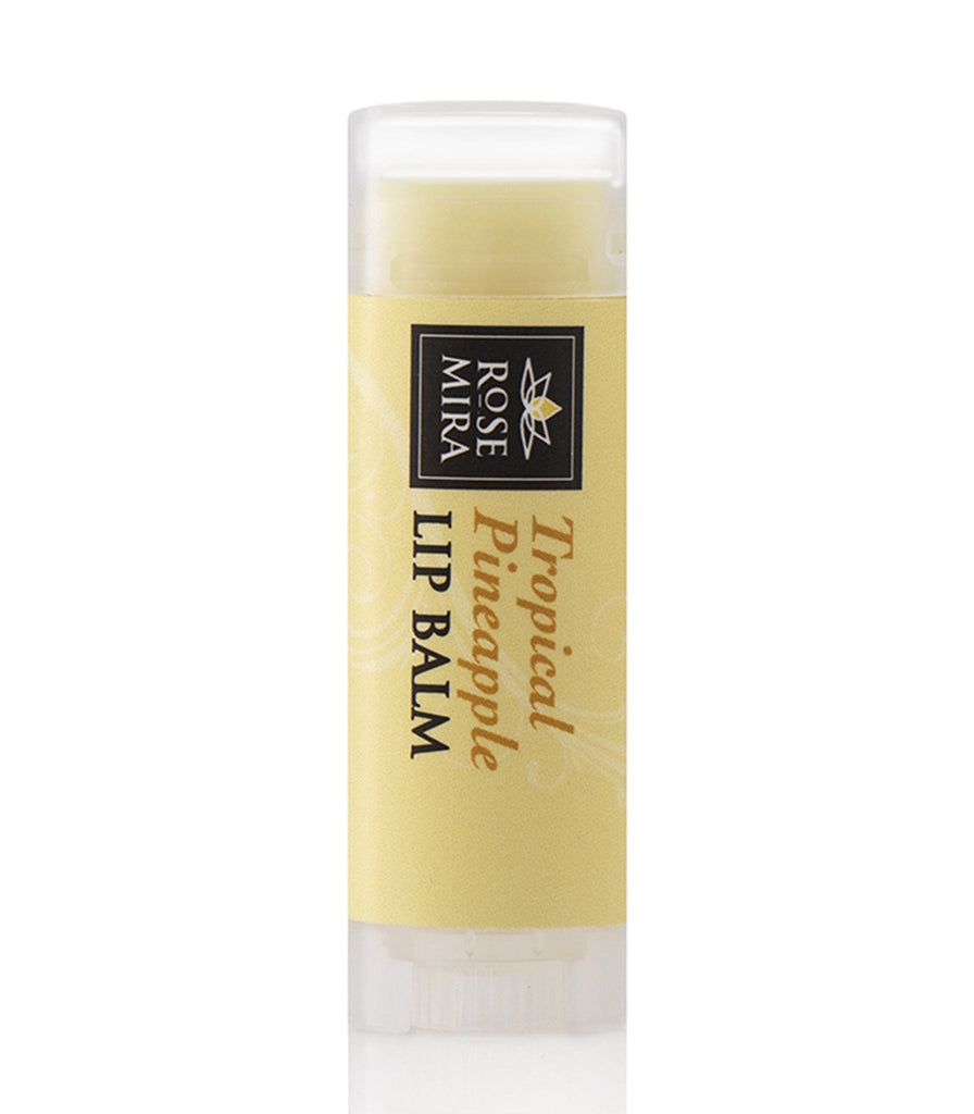 Organic tropical pineapple lip balm with yellow Rosemira label.