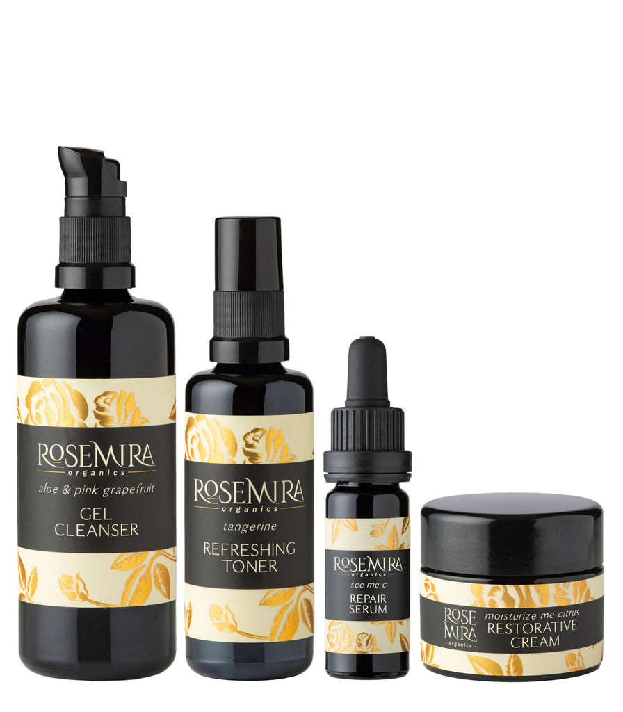 A cleanser, toner, serum, and moisturizing cream with citris theme as a kit for men