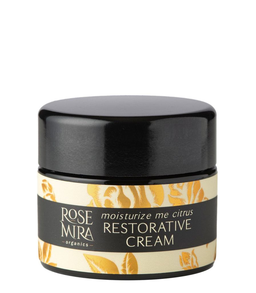 Moisturize Me Citrus Restorative Cream in miron glass on white